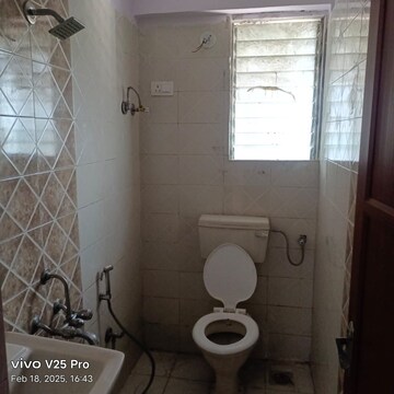 Bathroom in 3 BHK Apartment at Tanvi Eminence Phase II, Mira Road – for Rent
