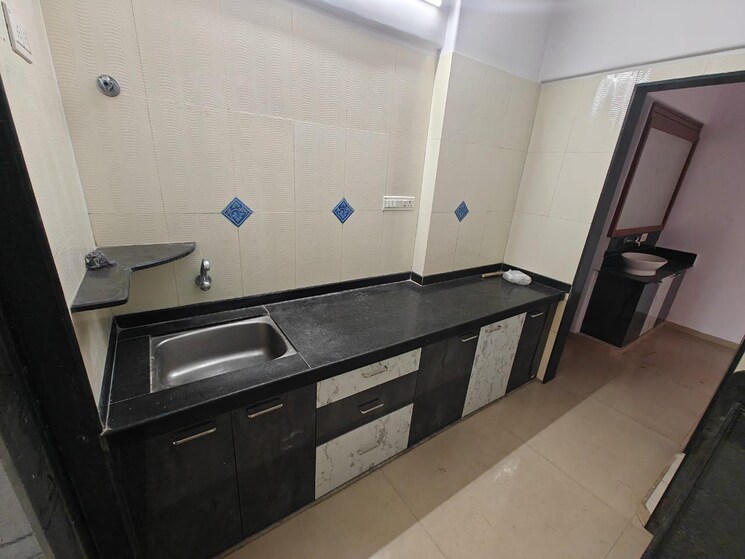 Kitchen, status-vihar 2 Bedroom 1200 Sq.Ft. Apartment In Kharghar Navi Mumbai 9463443