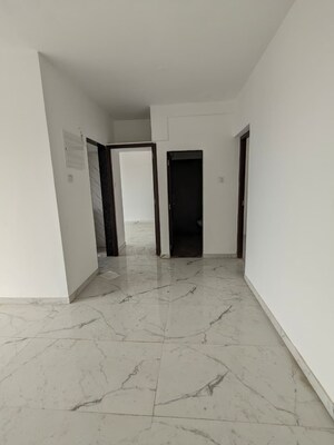 Building Lobby in 2 BHK Apartment at Dharti Pressidio, Kandivali West – for Sale