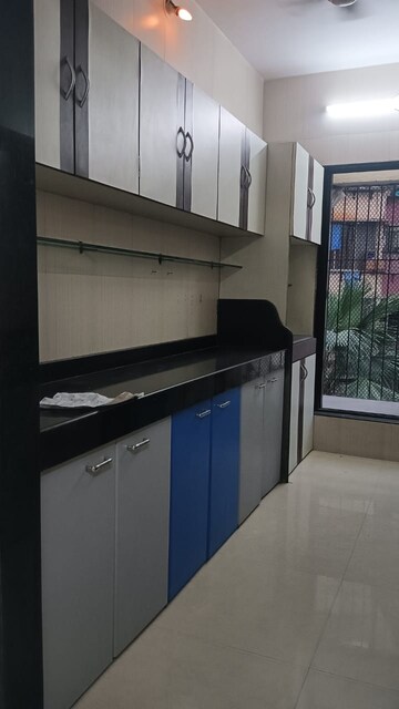 Kitchen in 2 BHK Apartment at Ratnakunj Apartment, Borivali West – for Sale