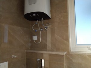 Bathroom in 4 BHK Apartment at Sarvodaya Enclave – for Rent