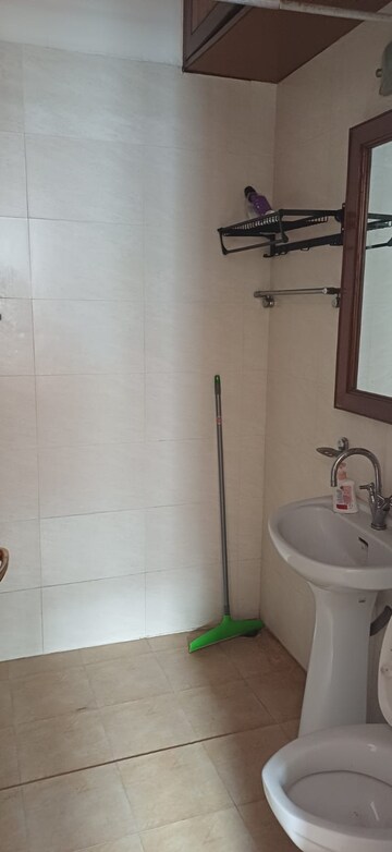 Bathroom in 3 BHK Apartment at Sarvodaya Enclave – for Rent