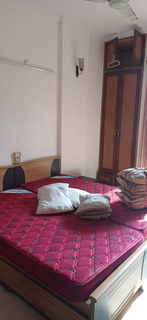 Bedroom in 3 BHK Apartment at Sarvodaya Enclave – for Rent