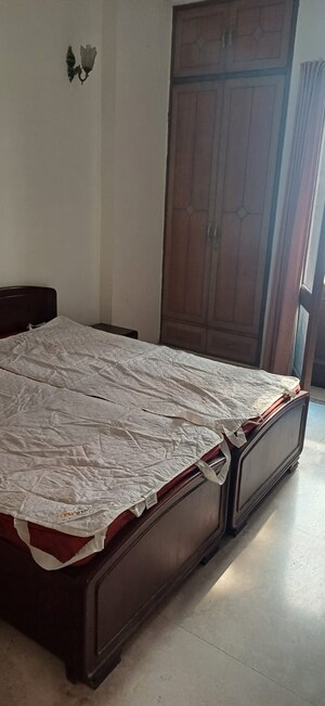Bedroom in 3 BHK Apartment at Sarvodaya Enclave – for Rent