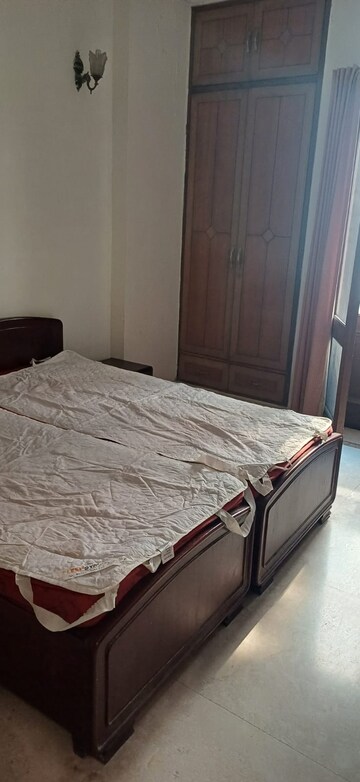 Bedroom in 3 BHK Apartment at Sarvodaya Enclave – for Rent