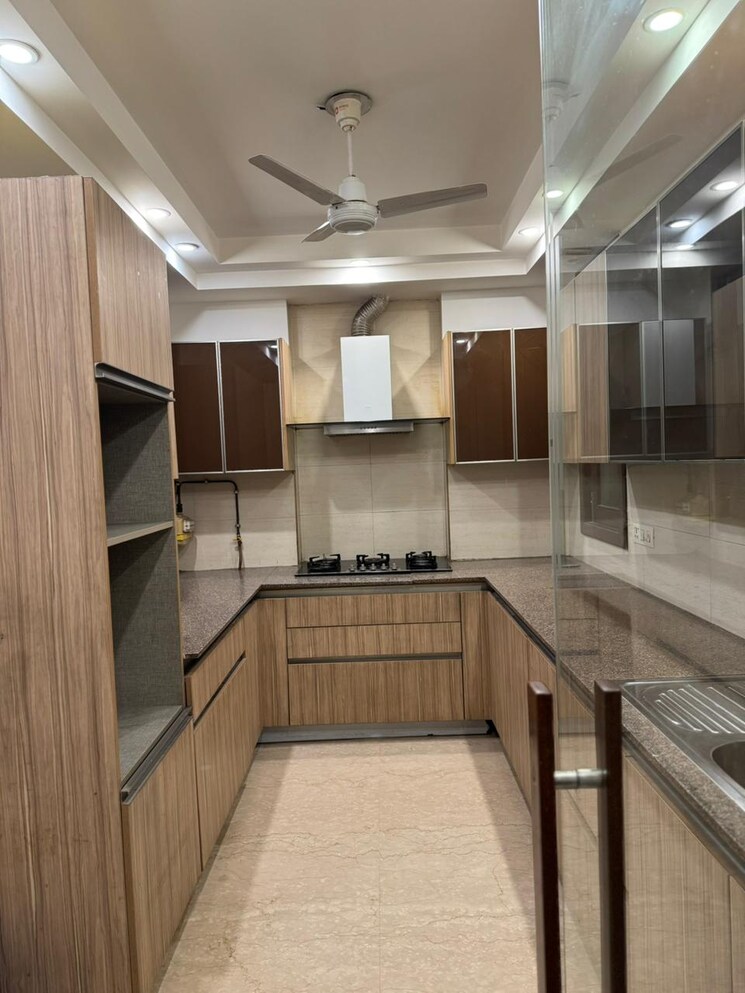 Kitchen, uday park 3 Bedroom 1850 Sq.Ft. Apartment In Uday Park Delhi 9463624