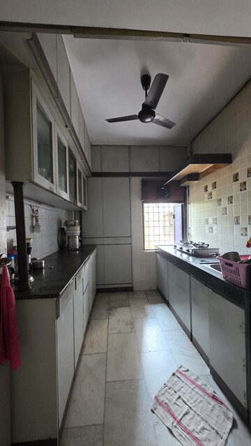 Kitchen in 2 BHK Apartment at Ashwattha Society, Vasant Vihar – for Sale