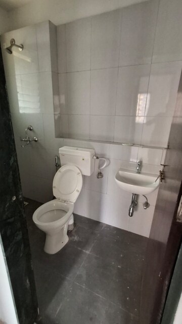 Bathroom in 2 BHK Apartment at Runwal Garden City, Balkum Pada – for Sale