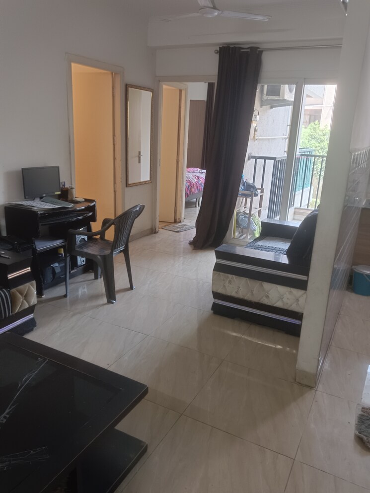 Living Room, gaur-atulyam 2 Bedroom 613 Sq.Ft. Apartment In Omicron I Greater Noida Greater Noida 9463843