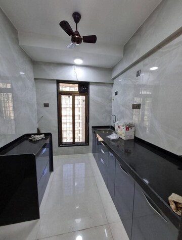 Kitchen in 2 BHK Apartment at DGS Sheetal Tapovan, Malad East – for Rent