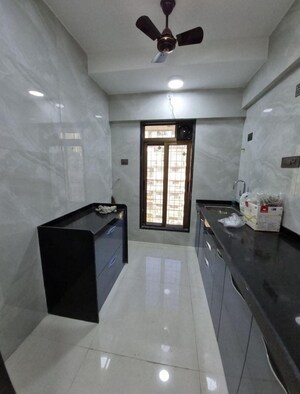 Kitchen in 2 BHK Apartment at DGS Sheetal Tapovan, Malad East – for Rent