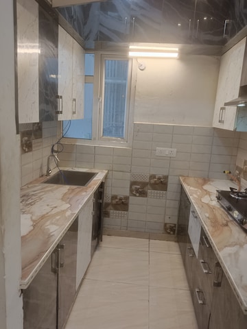 Kitchen in 3 BHK Apartment at Gaur Atulyam, Omicron I Greater Noida – for Rent