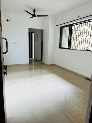 Living Room in 2 BHK Apartment at Lodha Lakeshore Greens, Dombivli East – for Sale