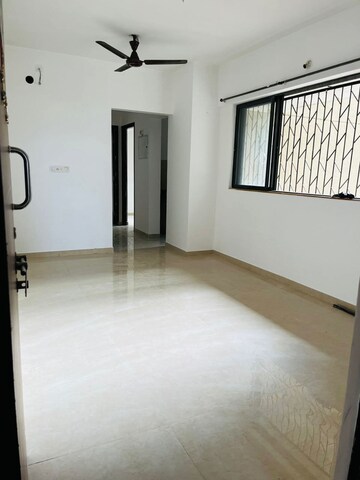 Living Room in 2 BHK Apartment at Lodha Lakeshore Greens, Dombivli East – for Sale