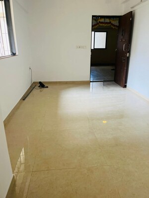 Living Room in 2 BHK Apartment at Lodha Lakeshore Greens, Dombivli East – for Sale