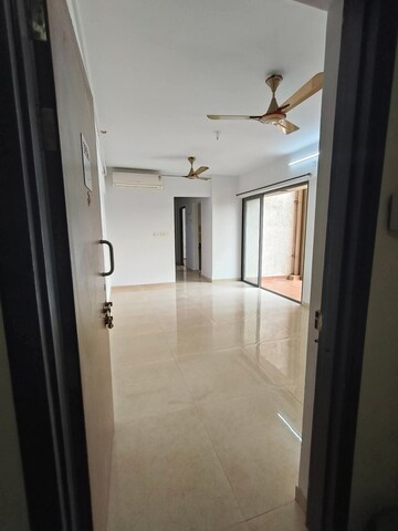Living Room in 2 BHK Apartment at Lodha Lakeshore Greens, Dombivli East – for Sale