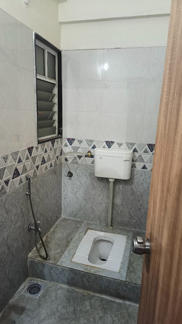 Master Bedroom in 1 BHK Apartment at Yogesh Gandharv Mithila, Moshi – for Rent