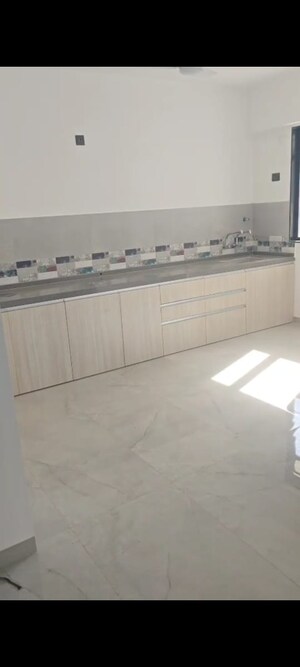 Kitchen in 2.5 BHK Apartment at Unique Youtopia, Kharadi – for Rent