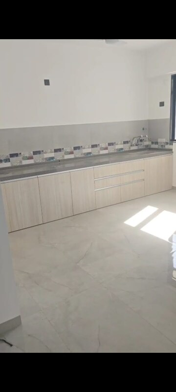 Kitchen in 2.5 BHK Apartment at Unique Youtopia, Kharadi – for Rent