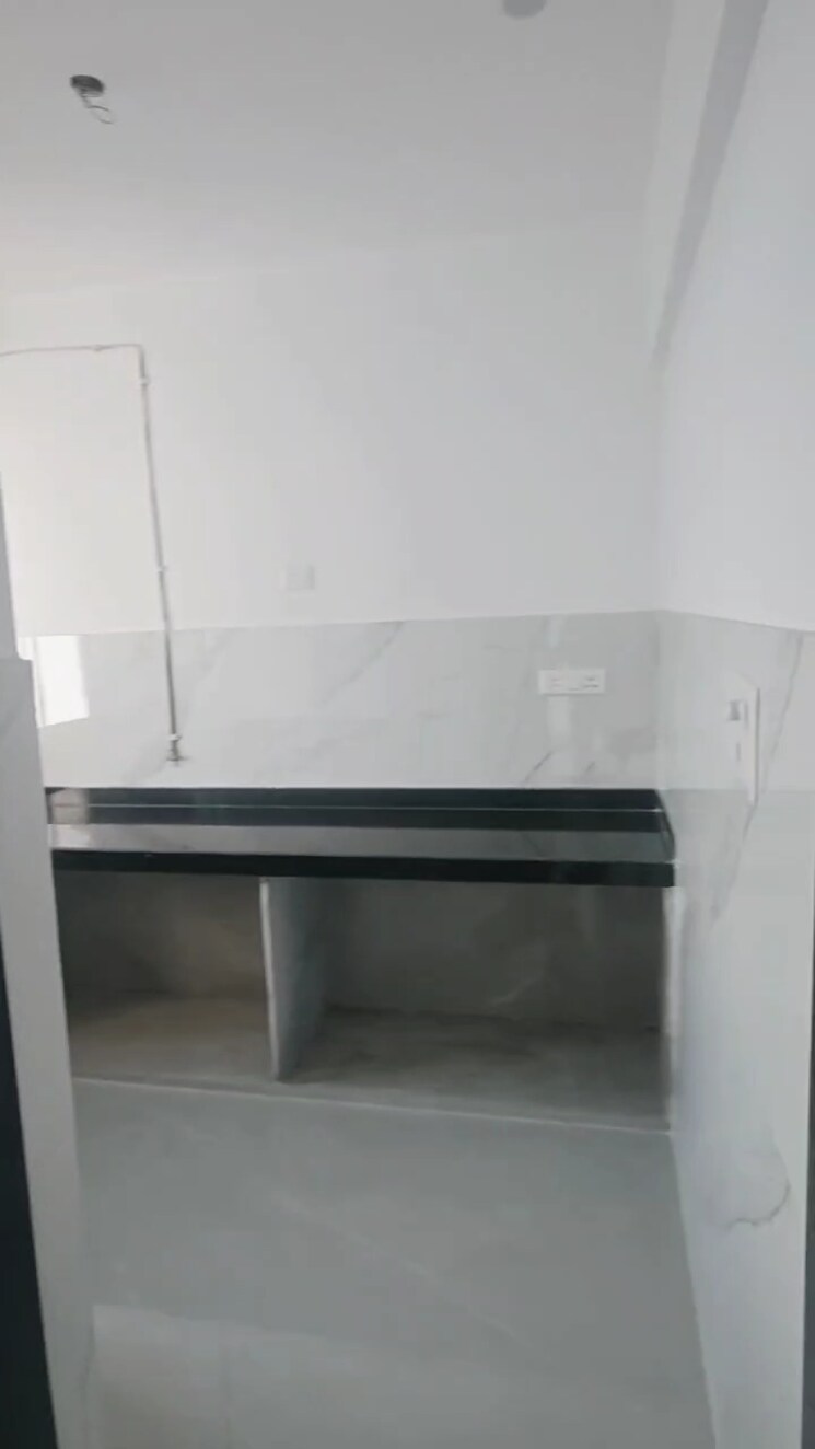 Kitchen, dev-leo-tower 2 Bedroom 750 Sq.Ft. Apartment In Oshiwara Mumbai 9464114