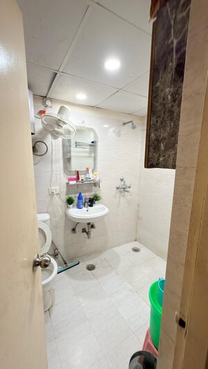 Bathroom in 4 BHK Apartment at Uninav Bliss, Raj Nagar Extension – for Sale