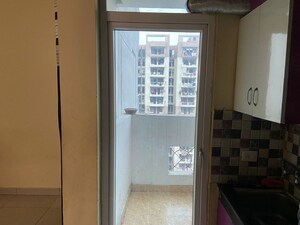 Building Lobby in 2 BHK Apartment at Proview Officer City 2, Raj Nagar Extension – for Sale
