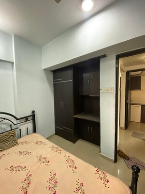 Living Room in 2 BHK Apartment at Lalani Residency, Kavesar – for Rent