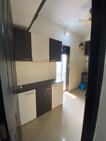Kitchen in 2 BHK Apartment at Lalani Residency, Kavesar – for Rent