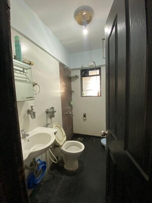 Bathroom in 2 BHK Apartment at Lalani Residency, Kavesar – for Rent