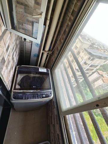 Balcony in 2 BHK Apartment at Cosmos Empress Park, Ghodbunder Road – for Rent