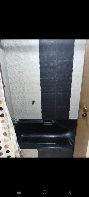 Bathroom in 3 BHK Apartment at Samartha Aangan, Andheri West – for Rent