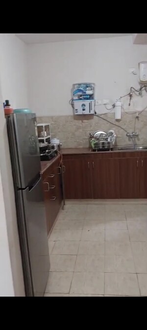 Kitchen in 3 BHK Apartment at Amrapali Golf Homes, Sector 4 Greater Noida – for Rent