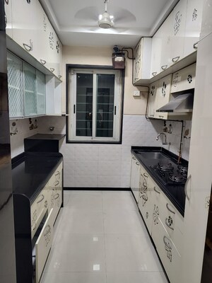 Kitchen in 2 BHK Apartment at Laxmi Narayan Residency, Vartak Nagar – for Rent