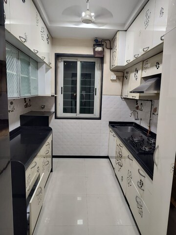 Kitchen in 2 BHK Apartment at Laxmi Narayan Residency, Vartak Nagar – for Rent