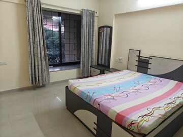 Bedroom in 2 BHK Apartment at Kapil Malhar Apartment, Baner – for Rent