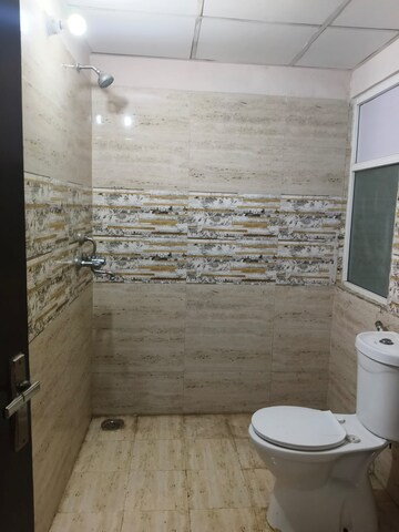 Bathroom in 1 BHK Apartment at Gaur City Mall, Sector 4 Greater Noida – for Sale