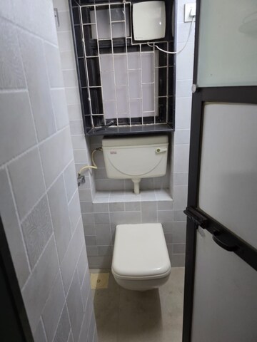 Bathroom in 2 BHK Apartment at Samkeet CHS, Vile Parle East – for Rent