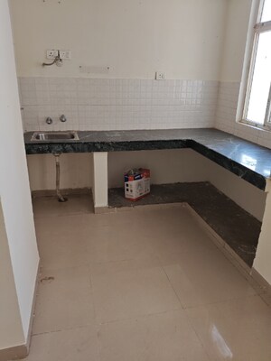 Kitchen in 2 BHK Apartment at Shree Vardhman Green Court, Sector 90 – for Rent