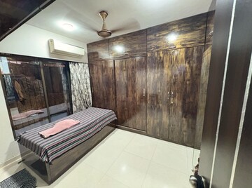 Bedroom in 1 BHK Apartment at Medha CHS, Kandivali West – for Sale