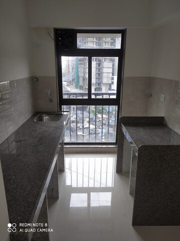 Living Room in 2 BHK Apartment at Parinee Essence, Kandivali West – for Sale