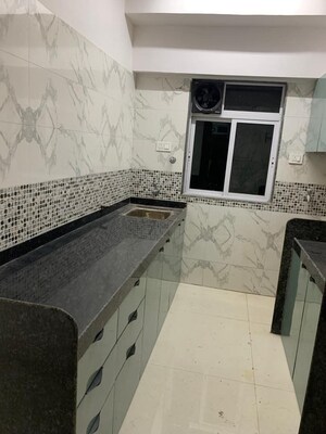 Kitchen in 2 BHK Apartment at DGS Sheetal Tapovan, Malad East – for Rent