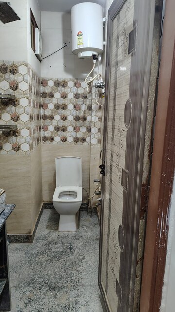 Bathroom in 2 BHK Builder Floor at Dwarka Mor – for Rent