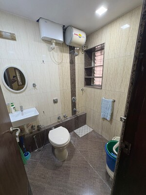 Bathroom in 2 BHK Apartment at Premal Apartment, Santacruz West – for Rent