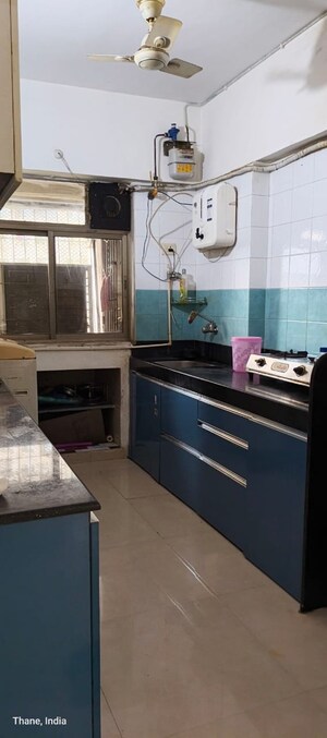 Kitchen in 1 BHK Apartment at Neelkanth Greens, Manpada – for Rent