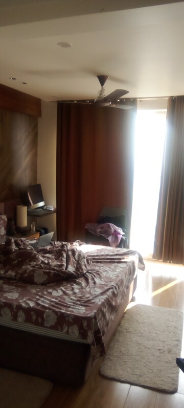 Living Room in 4 BHK Apartment at Parker White Lily, Sector 8 – for Sale