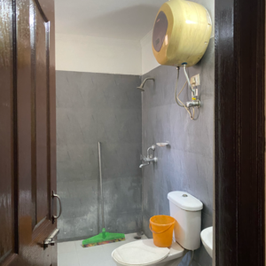 Bathroom in 1 BHK Apartment at Maya Garden City, Nagla Road – for Rent
