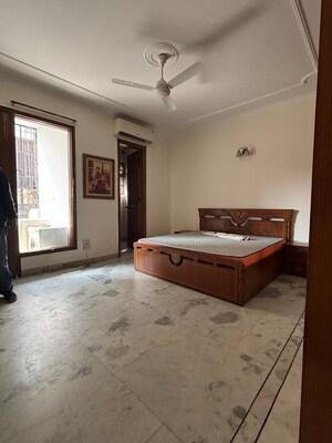 Bedroom in 3 BHK Builder Floor at Boutique Residential Apartments C-253, Defence Colony – for Rent
