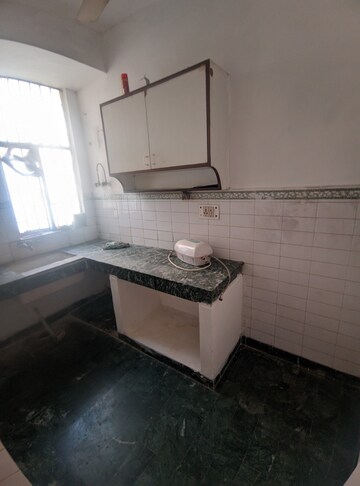 Kitchen in 2 BHK Apartment at Eros Southend Apartments, Charmwood Village – for Sale