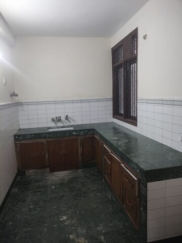 Kitchen in 3 BHK Apartment at Eros Cliffton Apartments, Charmwood Village – for Rent