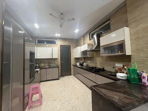 Kitchen in 3 BHK Builder Floor at DLF Gardencity Enclave, Sector 93 – for Sale